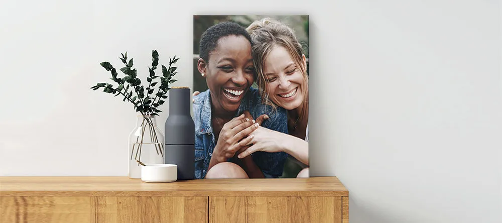 Black and white family photos in a hallway