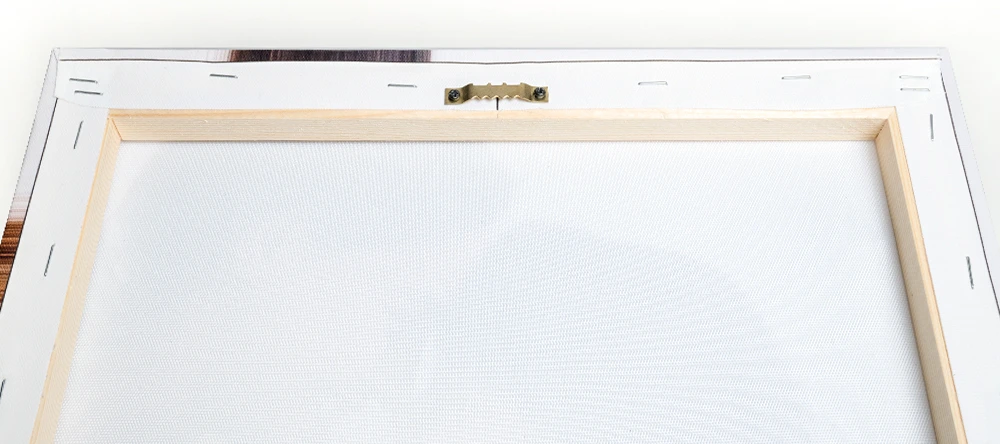 How to hang your canvas print. The complete guide. Sawtooth hanger on stretcher bar.