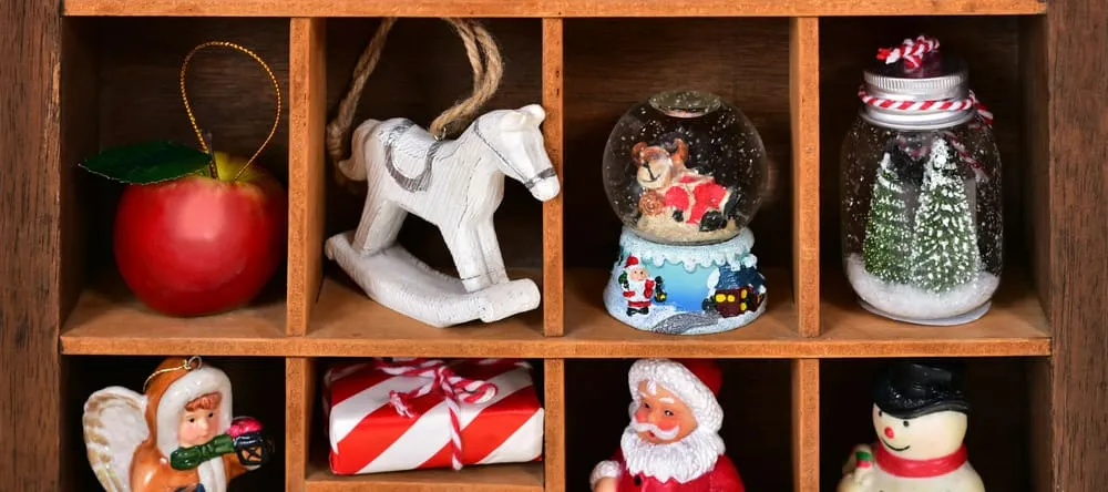 What is a Shadowbox Frame. Christmas decorations in compartments of wooden box.