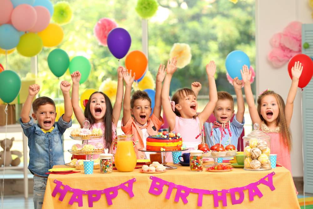 A family gathered around a birthday cake, celebrating together and illustrating heartfelt birthday messages for close family members.