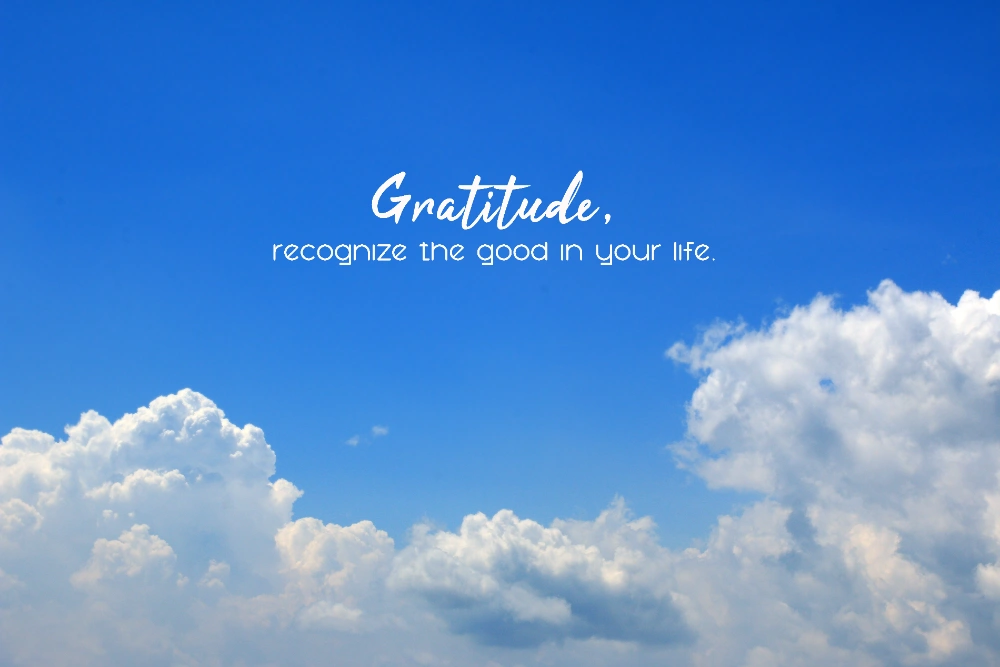 A beautifully designed minimalist space with a short inspirational quote on wall art