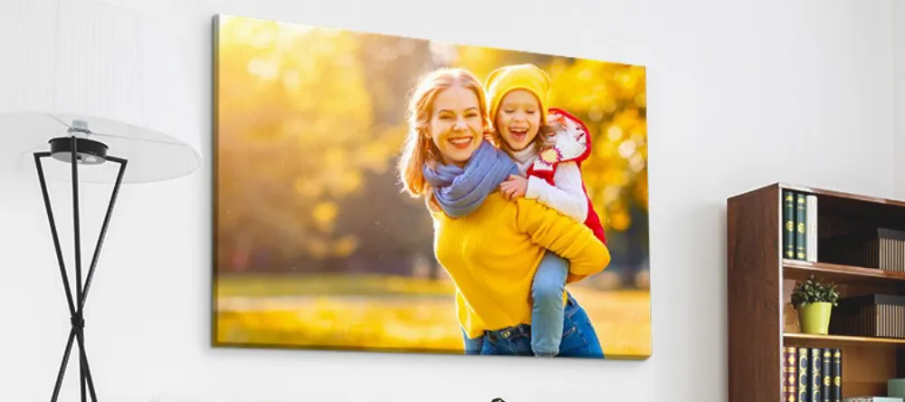 What is Lamination on Canvas Prints. Print on wall showing woman giving child piggy back.