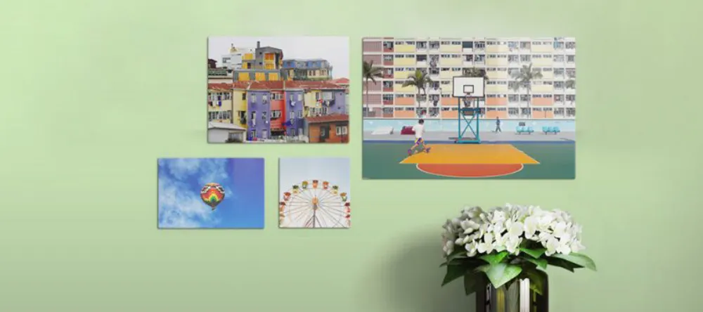 What is an aluminium print. Multiple colorful aluminium photo prints displayed on wall.