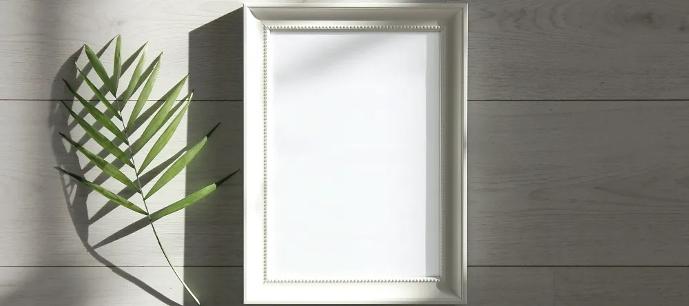How to Hang Acrylic Prints. A beautiful white empty frame.