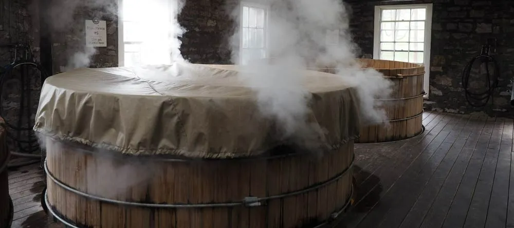 Can You Hang Canvas Prints in a Bathroom? Steaming old-fashioned hot tub.