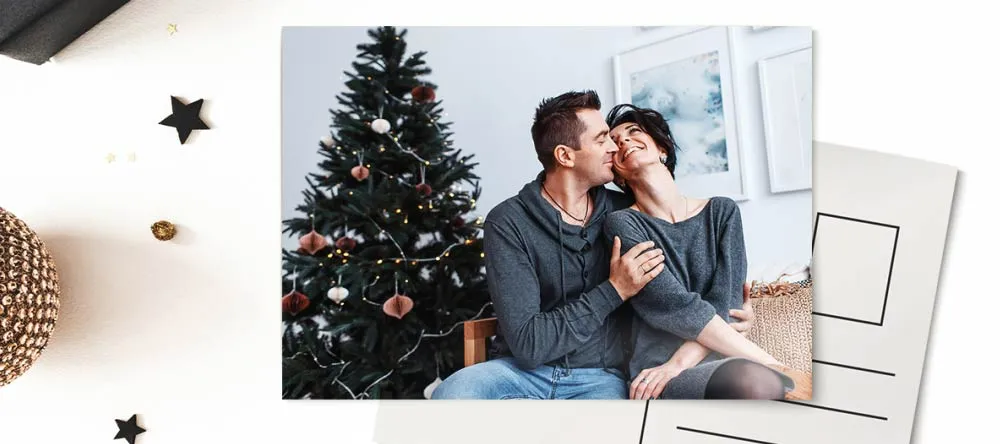 Personalised Photo Christmas Cards. Beautiful personalised Christmas card lying on table.