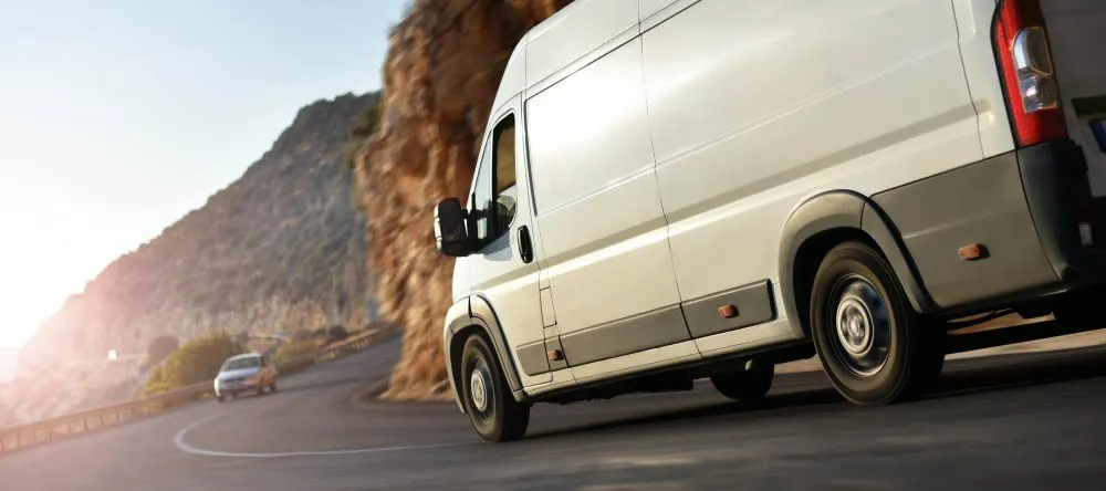How We Get Your Canvas Prints Delivered on Time. Delivery van on road.