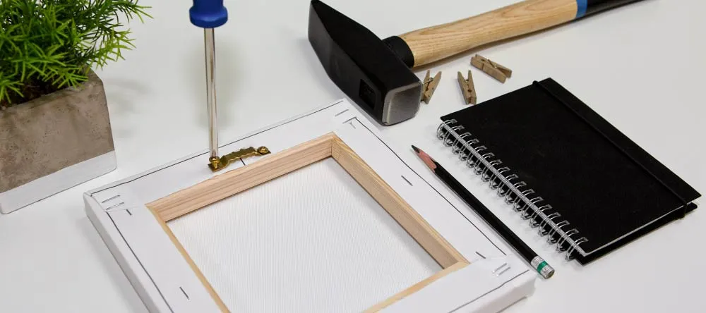 Hanging Kit for Canvas – Do You Need It? Using screwdriver to attach sawtooth hanger to canvas print.