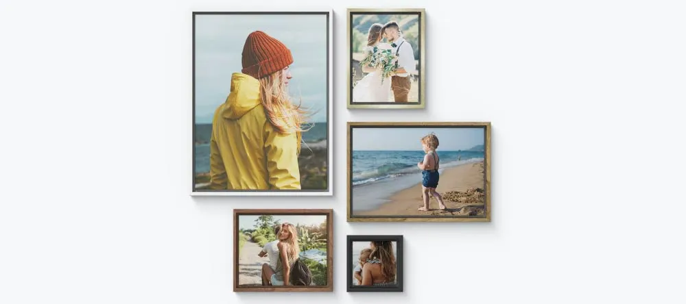 Should Canvas Prints Be Framed? Gallery wall of framed photo canvas prints.s.