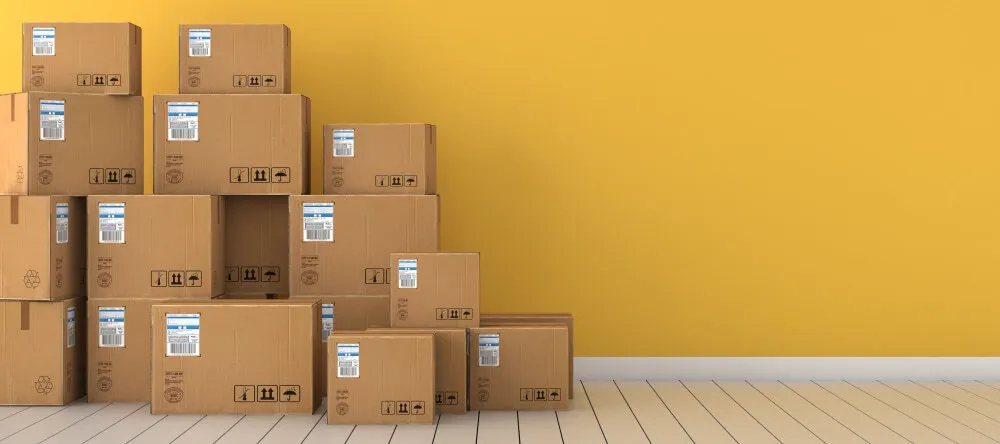 Canvas Prints with Free Shipping. Pile of parcels in room.