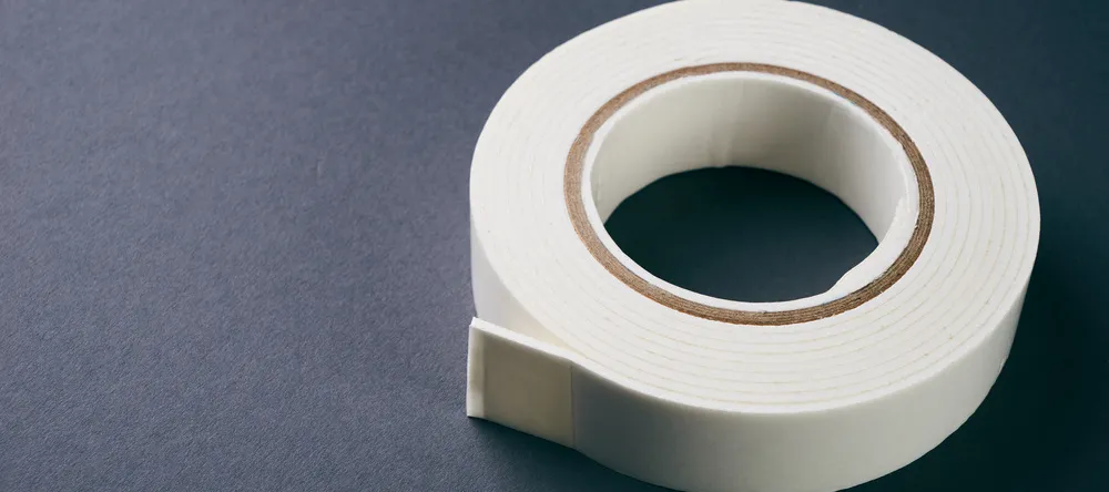 How to Hang Posters without Damaging the Wall. Roll of tape.