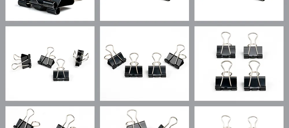 How to Hang Posters without Damaging the Wall. Black poster hanging clips.