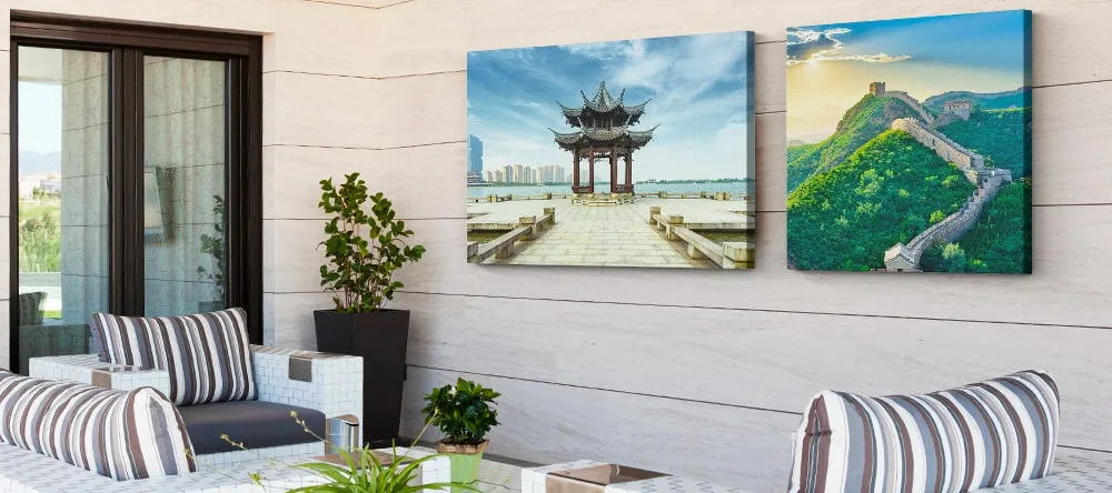 Outdoor Canvas Art. Two canvas prints on outdoor wall.