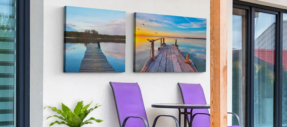 Outdoor Canvas Art. Two canvas prints on outdoor wall.
