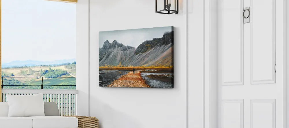Outdoor Canvas Art. Canvas print on wall outside.