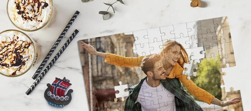 Make Your Own Jigsaw Puzzle: We Show You How. Personalised Puzzle with a Romantic Theme on a Table.