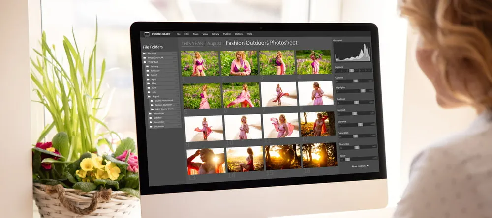 How to Print on Acrylic. Woman looking at photos on desktop computer.