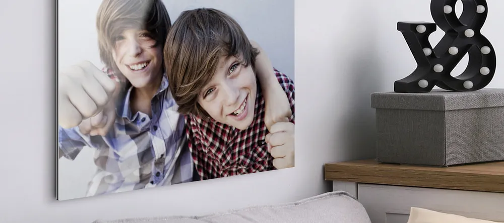 How to Print on Acrylic. Acrylic print on wall showing two teenage boys.