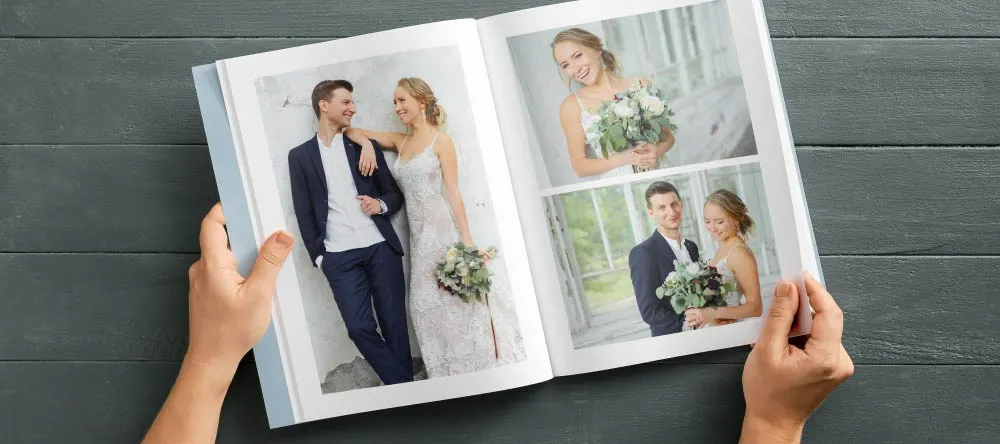 Wedding photo book open on a table