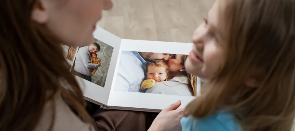 Birthday photo book: a family flipping through a photo book