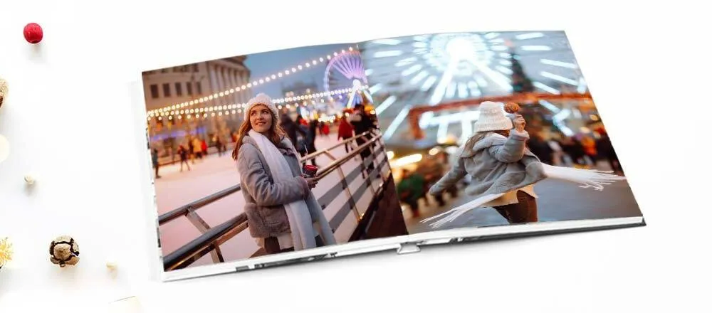 What is a Photo Book. Photo book featuring wintery scenes.