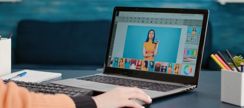 How to edit photos: a person editing photos on their computer