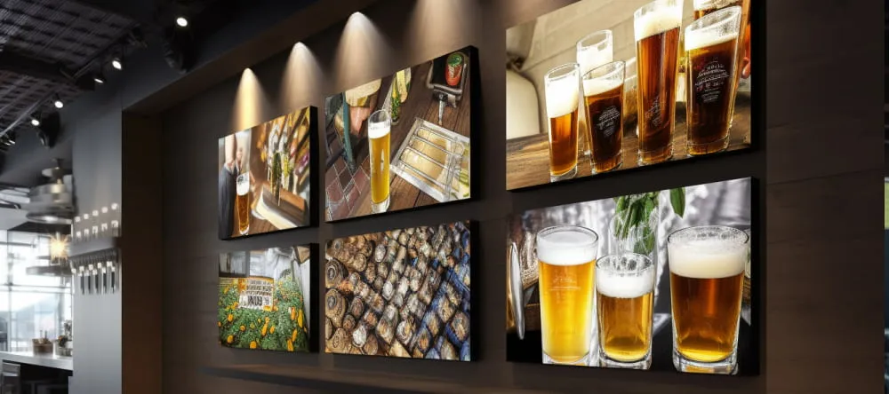 Pub Wall Art. Prints on wall featuring glasses of beer.