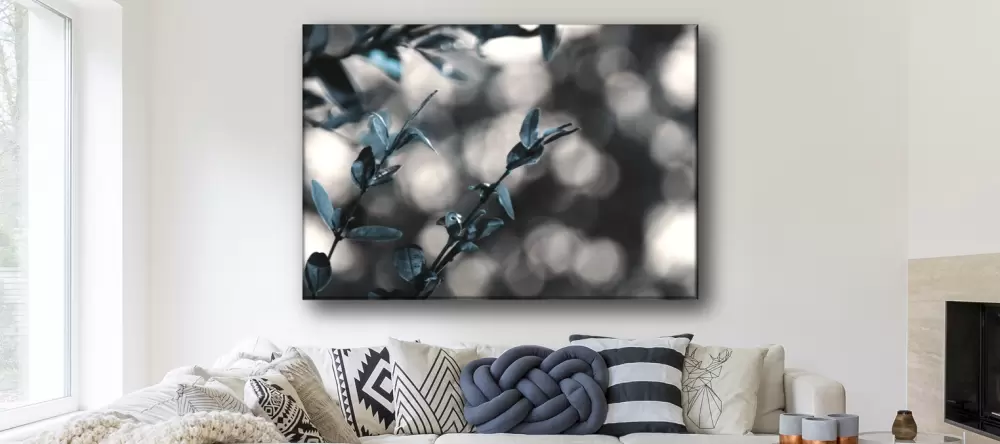 How Long Do Canvas Prints Last? Picture of branches on living room wall.