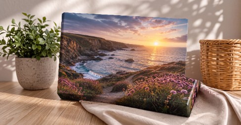 A vibrant gallery-wrapped canvas photo print hanging above a sofa in a bright UK living room