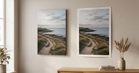 A photo board and a bare poster of the same coastal scene hung side by side on a white wall