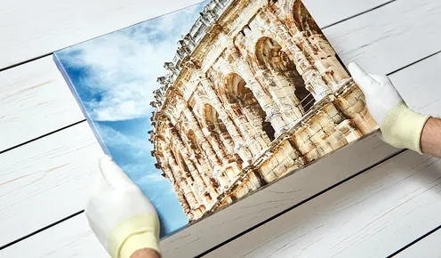 Holding Canvas Print with Gloves