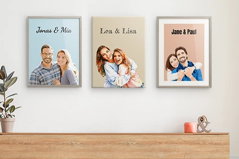 framed couple portraits on wall