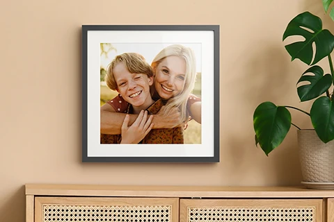 framed print of mother and son