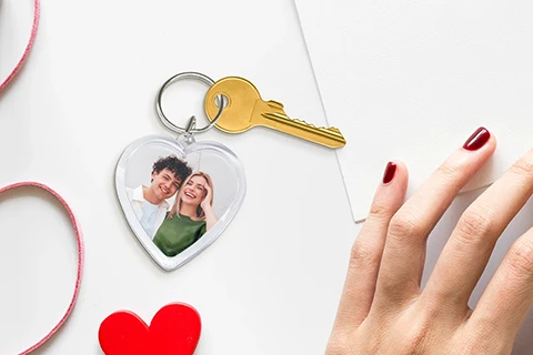 heart shaped keyring with a photo of a couple