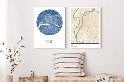 two city map prints on a wall