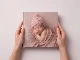 20x20 photo book gallery cover held in hands thumbnail