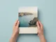 travel photo book gallery cover held in hands 80x60