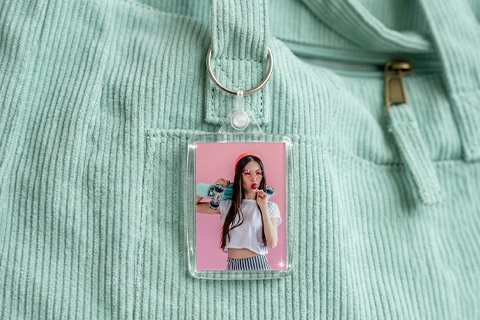 Acrylic keyring clipped to handbag