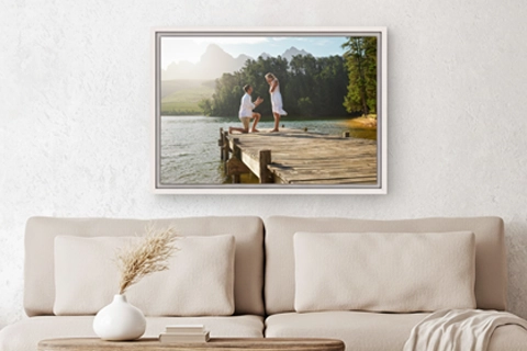 framed canvas of a couple placed above the sofa