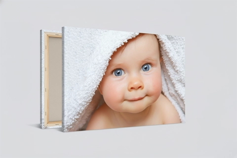 display of a mini canvas with a baby picture