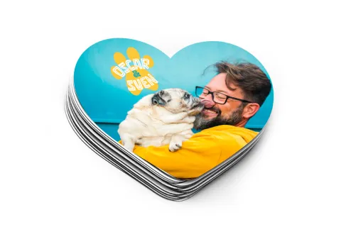 Stack of personalised heart-shaped photo stickers with pet photo design