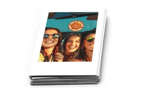 Stack of personalised retro-style photo stickers with friends photo design