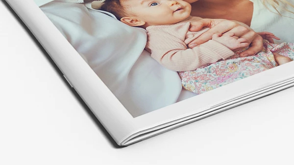 Saddle-stitched booklet photo book corner detail