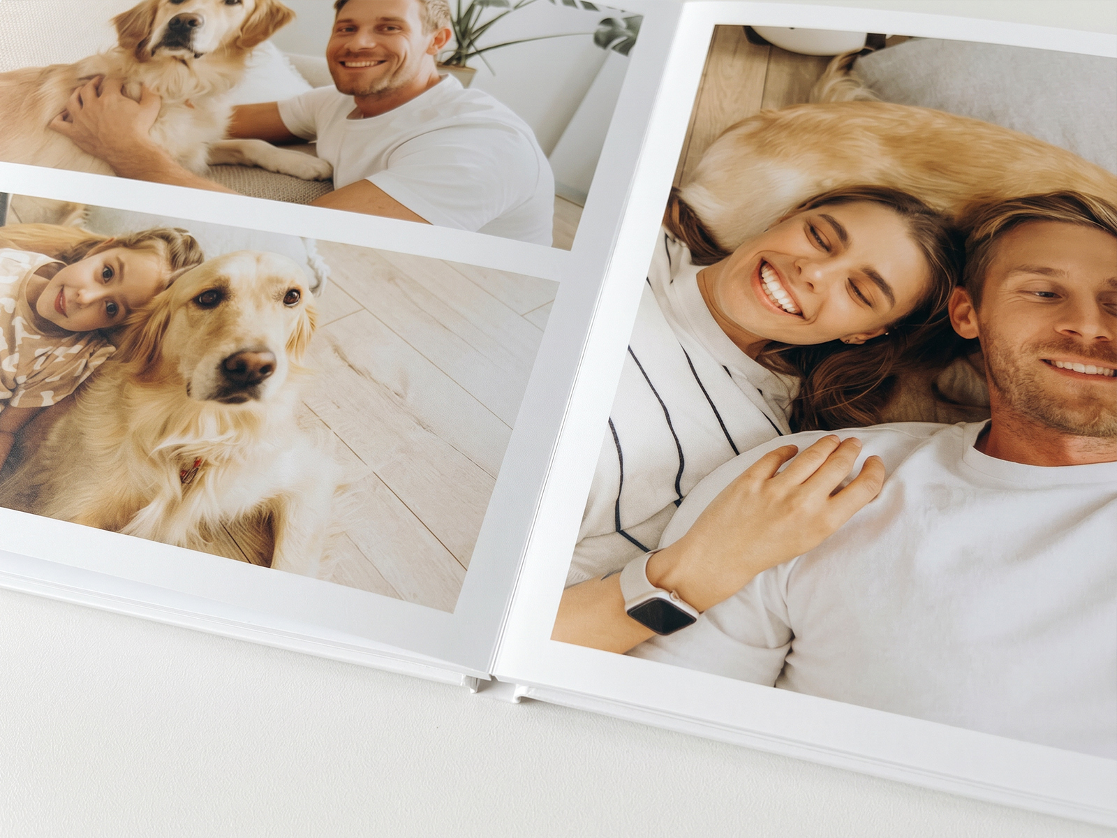 Open photo book lying dead-flat — a panoramic spread flowing uninterrupted across both pages with no gutter break